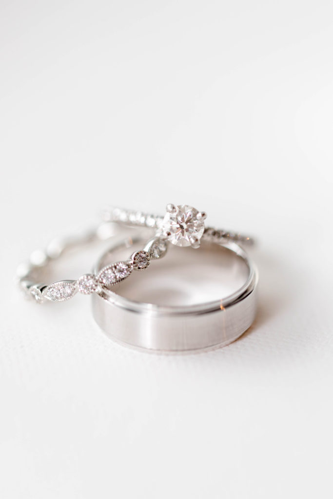 Bride and Groom's wedding bands on white background